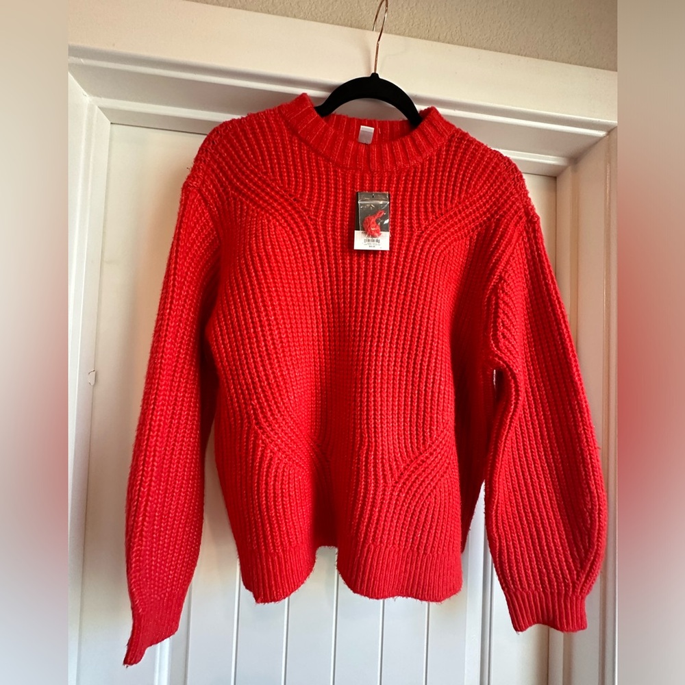 Women’s sweater by Nine West. New with tags. Vibrant orange color.